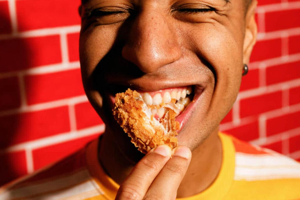 Man eating plant-based food